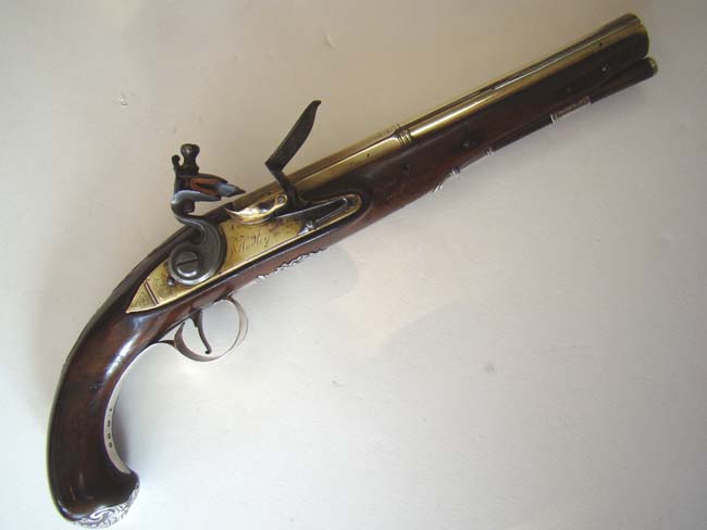 An historically important Revolutionary War period silver mounted brass barreled pistol owned by Capt. S. Baggot of the 17th Regiment Light Dragoons.